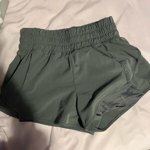 Woman’s green shorts with spandex